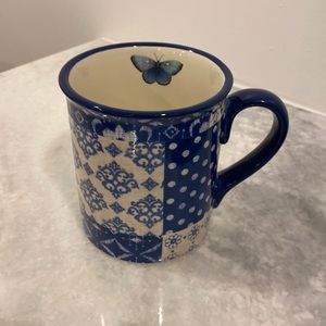 Certified International blue multi-colored glass mug.